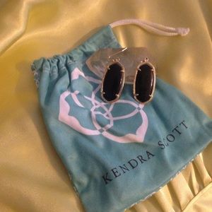 Kendra Scott dangling earrings.